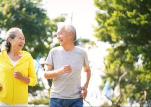 Mature couple going for a run as part of his semaglutide treatment.