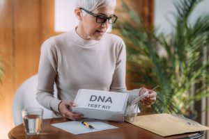 Woman prepping at home DNA testing kit