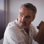 Man sitting and looking to the side