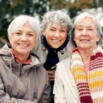 Postmenopausal women sitting on bench