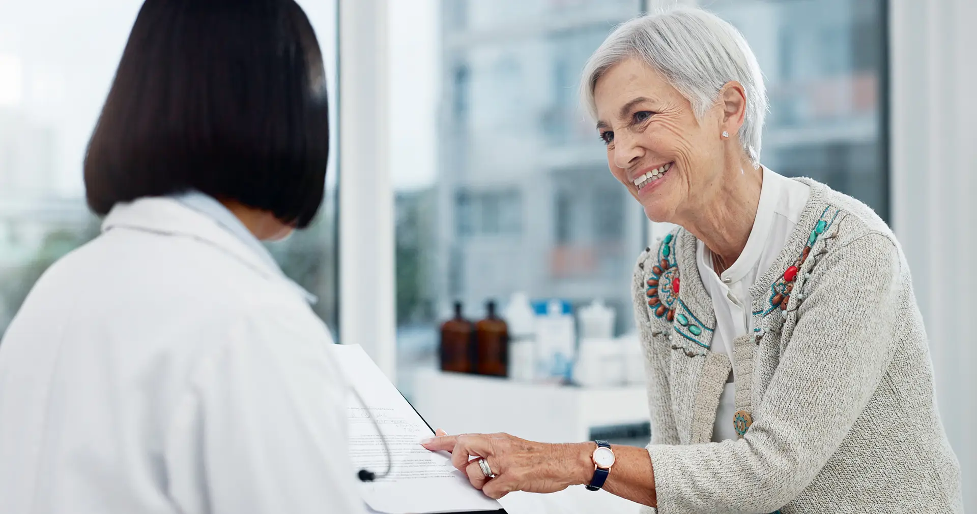 woman talking with doctor